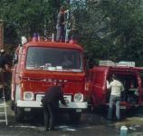 Oude foto korps Beringen wast de brandweerwagens